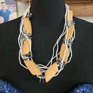 Elegant Multi-Strand Necklace with White and Tan Beads